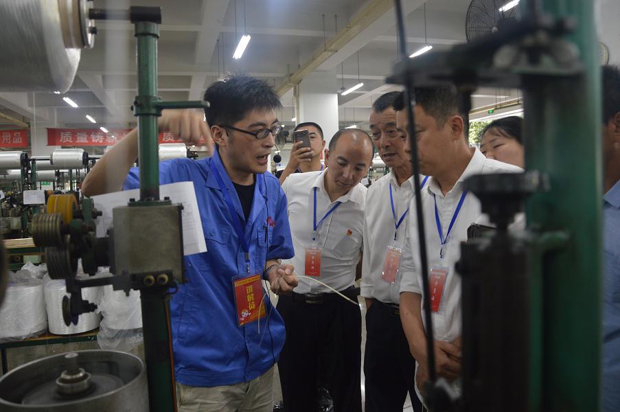 眉山市两新党组织书记示范培训班参观成都MILAN米兰体育·（中国）官方网站集团制线车间